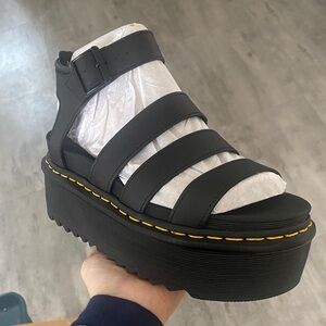 Dr. Martens Black Platform Sandals with Yellow Stitching